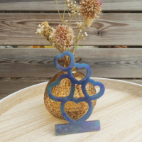 Hartjes op stapel in kaarsenhouder